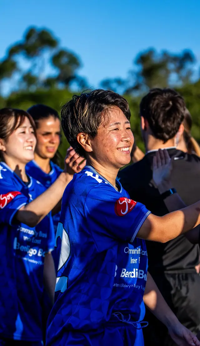 A Box Hill United player on the sideline at golden hour, from an Urban Media shoot