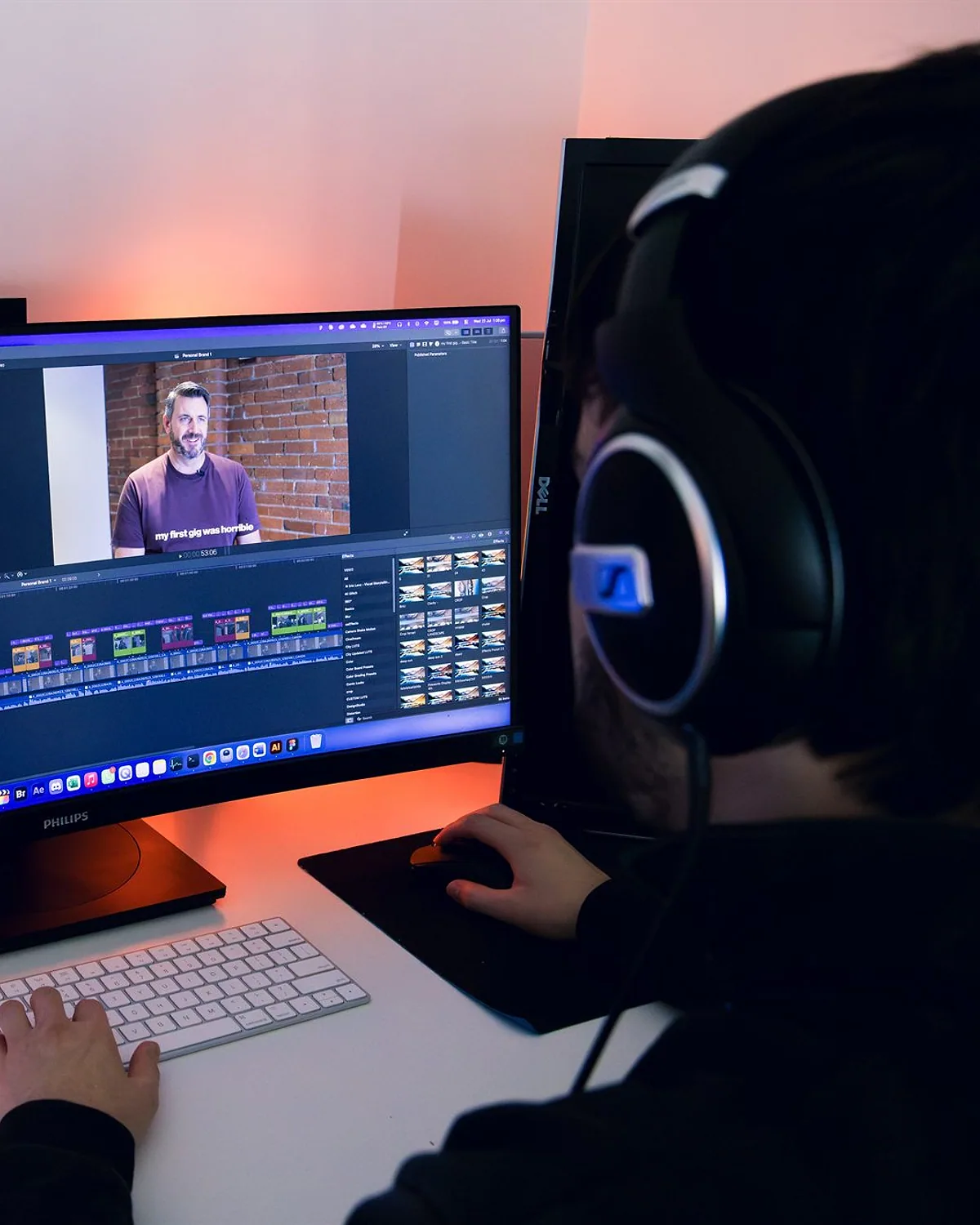 An interview edit open on a desktop monitor, the clip playing above its timeline.